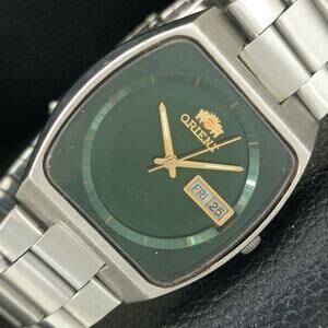 Vintage 1972 Orient Automatic Mens Silver Watch W/daydate & Green accents